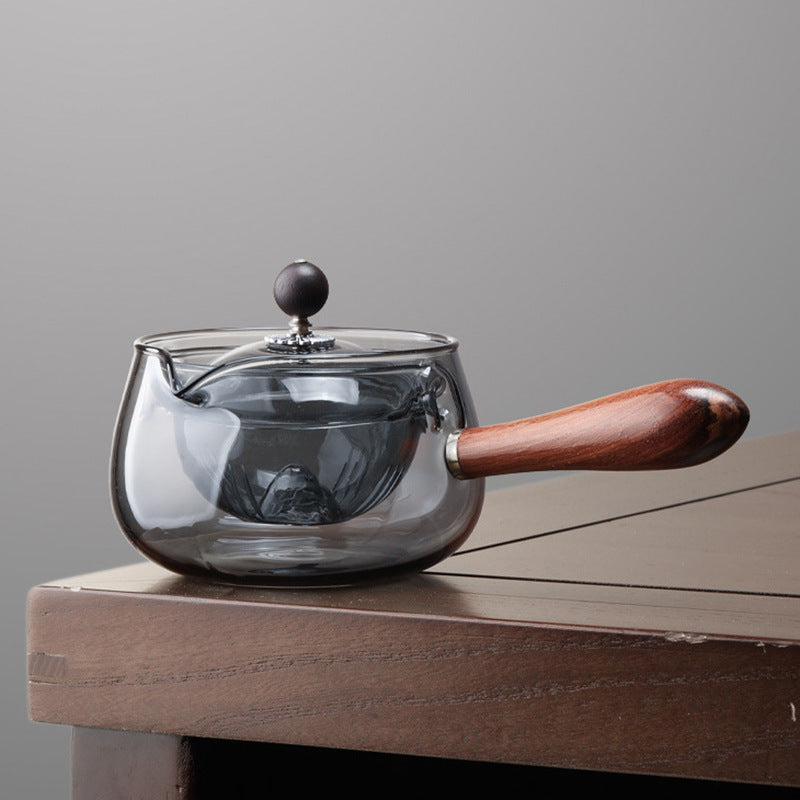 Elegant Glass Rotating Teapot