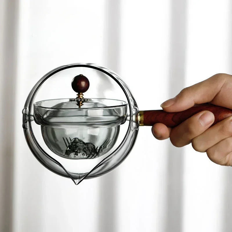 Elegant Glass Rotating Teapot