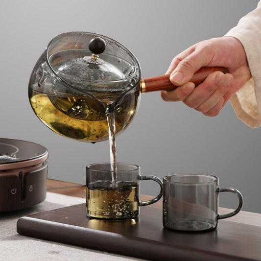 Elegant Glass Rotating Teapot